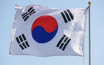 SEOUL, SOUTH KOREA - 2023/03/05: The South Korean flag also known as the Taegukgi is seen flying in Dongdaemun Design Plaza in Seoul. (Photo by Kim Jae-Hwan/SOPA Images/LightRocket via Getty Images)