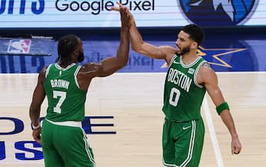 INDIANAPOLIS, INDIANA - MAY 27: (L-R) Jaylen Brown #7 of the Boston Celtics and Jayson Tatum #0 of the Boston Celtics high five during the second quarter in Game Four of the Eastern Conference Finals at Gainbridge Fieldhouse on May 27, 2024 in Indianapolis, Indiana. NOTE TO USER: User expressly acknowledges and agrees that, by downloading and or using this photograph, User is consenting to the terms and conditions of the Getty Images License Agreement. (Photo by Dylan Buell/Getty Images)