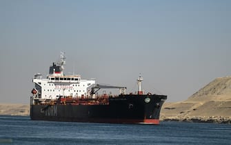 ISMAILIA, EGYPT - JANUARY 10: A ship transits the Suez Canal towards the Red Sea on January 10, 2024 in Ismailia, Egypt. In the wake of Israel's war on Gaza after the October 7 Hamas attack on Israel, Houthi rebels in Yemen pledged disruption on all ships destined for Israel through the Red Sea's Suez Canal. The disruption on world trade is evident in the number of companies using this container ship route - a 90 per cent decline compared to figures one year ago. (Photo by Sayed Hassan/Getty Images)