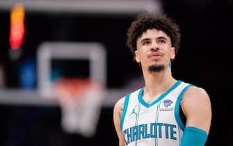 CHARLOTTE, NORTH CAROLINA - NOVEMBER 22: LaMelo Ball #1 of the Charlotte Hornets looks on in the first quarter during their game against the Washington Wizards at Spectrum Center on November 22, 2023 in Charlotte, North Carolina. NOTE TO USER: User expressly acknowledges and agrees that, by downloading and or using this photograph, User is consenting to the terms and conditions of the Getty Images License Agreement. (Photo by Jacob Kupferman/Getty Images)