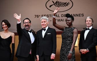 (From L) British actress Phoebe Waller-Bridge, US director James Mangold, US actor Harrison Ford, US actress Shaunette Renee Wilson and Danish actor Mads Mikkelsen arrives for the screening of the film "Indiana Jones and the Dial of Destiny" during the 76th edition of the Cannes Film Festival in Cannes, southern France, on May 18, 2023. (Photo by LOIC VENANCE / AFP) (Photo by LOIC VENANCE/AFP via Getty Images)