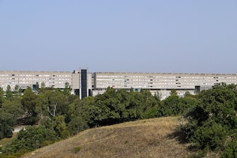 A picture taken on July 28, 2012 shows the social housing complex of Corviale, on the outskirts of Rome.  AFP PHOTO / ANDREAS SOLARO        (Photo credit should read ANDREAS SOLARO/AFP/GettyImages)