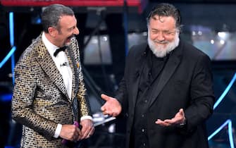 Sanremo Festival host and artistic director Amadeus (L) with Australian actor Russell Crowe perform on stage at the Ariston theatre during the 74th Sanremo Italian Song Festival, in Sanremo, Italy, 08 February 2024. The music festival will run from 06 to 10 February 2024.  ANSA/ETTORE FERRARI