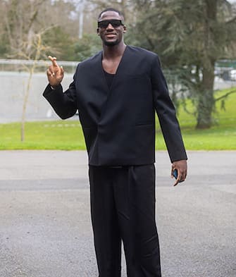 epa11227786 French soccer player Ibrahima Konate poses as he arrives at the national team's training complex ahead a training session in Clairefontaine-en-Yvelines, south of Paris, France, 18 March 2024. France will face Germany for a friendly match on 23 March 2024.  EPA/CHRISTOPHE PETIT TESSON