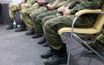 Foreign soldiers made prisoners of war (POW) after being captured by Ukraine as combattants within the Russian armed forces, take part in a press conference organised by Ukrainian officials in Kyiv, on March 15, 2024, amid the Russian invasion in Ukraine. Speaking at a press conference organised by Ukrainian officials, eight POWs from Cuba, Nepal, Sierra Leone and Somalia said they were lured with promises of high wages, non-frontline roles or simply tricked. Organisers defined the men as "mercenaries" from the "global South" and said they were treating them the same as Russian POWs. (Photo by Anatolii STEPANOV / AFP)
