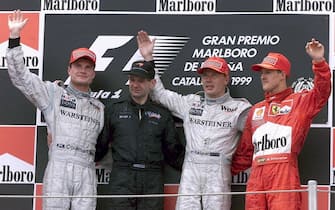 B118 - 19990530 - BARCELONA, SPAIN: (L-R) Second placed Scottish David Coulthard, Andrew Newey, victorious Finn Mika Hakkinen and third placed Michael Schumacher wave from the podium of the Spanish Grand Prix at Montmelo circuit in Barcelona, Sunday 30 May 1999.
EPA PHOTO/EFE/ALBERT OLIVE/J.M.-hh