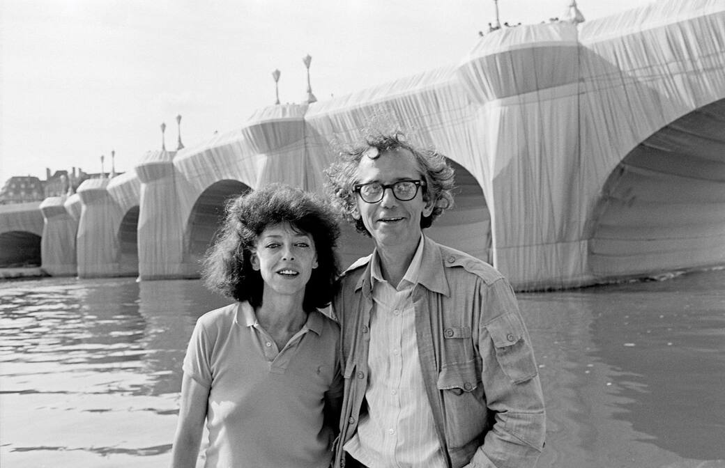Christo and Jeanne-Claude at The Pont Neuf Wrapped. Paris, 1985. Photo: Wolfgang Volz© 1985 Christo and Jeanne-Claude Foundation