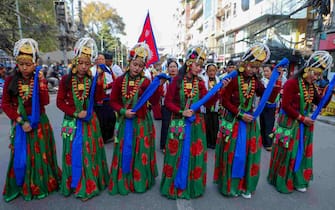 KATHMANDU, NEPAL-DECEMBER 31: Nepalese women from the Gurung community dressed in traditional attire dance as they take part in the parade to mark the Tamu Lhosar or New Year in Kathmandu, Nepal on December 31, 2023. (Photo by Sunil Pradhan/Anadolu via Getty Images)