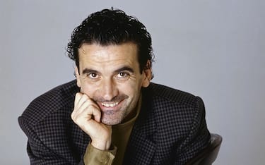 Italian actor and director Massimo Troisi smiling sitting on a chair. 1989  (Photo by Rino Petrosino\Mondadori via Getty Images)