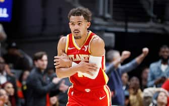 ATLANTA, GEORGIA - NOVEMBER 22: Trae Young #11 of the Atlanta Hawks reacts after a three-point basket against the Brooklyn Nets during the second half at State Farm Arena on November 22, 2023 in Atlanta, Georgia. NOTE TO USER: User expressly acknowledges and agrees that, by downloading and or using this photograph, User is consenting to the terms and conditions of the Getty Images License Agreement. (Photo by Alex Slitz/Getty Images)
