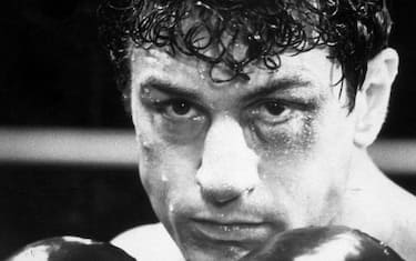 Robert De Niro portrays boxer Jake La Motta in the 1980 film Raging Bull. De Niro won an Oscar for Best Actor for his role of the American boxer, Jake La Motta.