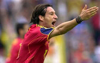 BRG012-20000621-BRUGES, BELGIUM:Spanish Alfonso jubilates after scored for his team against Yugoslavia  during the Euro 2000 group C soccer match between Yugoslavia and Spain in Bruges, Wednesday 21 June 2000. (ELECTRONIC IMAGE) EPA PHOTO /BENOIT DOPPAGNE