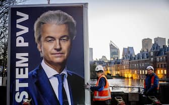 epaselect epa10990483 An election sign of PVV leader Geert Wilders is removed near the Binnenhof, a day after the Lower House elections, in The Hague, Netherlands, 23 November 2023. The PVV party is set to win the parliamentary elections with 37 seats after most votes were counted. Dutch voters went to the polls on 22 November to elect the members of the House of Representatives and a new prime minister, after Netherlands' longest-serving prime minister, Mark Rutte's cabinet collapsed in July.  EPA/ROBIN UTRECHT