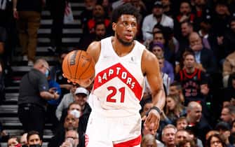 TORONTO, CANADA - APRIL 28: Thaddeus Young #21 of the Toronto Raptors dribbles the ball during the game against the Philadelphia 76ers during Round 1 Game 6 of the 2022 NBA Playoffs on April 28, 2022 at the Scotiabank Arena in Toronto, Ontario, Canada.  NOTE TO USER: User expressly acknowledges and agrees that, by downloading and or using this Photograph, user is consenting to the terms and conditions of the Getty Images License Agreement.  Mandatory Copyright Notice: Copyright 2022 NBAE (Photo by Vaughn Ridley/NBAE via Getty Images)