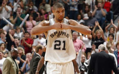 SAN ANTONIO - MAY 13:  Tim Duncan #21 of the San Antonio Spurs walks on the court in Game five of the Western Conference Semifinals against the Los Angeles Lakers during the 2003 NBA Playoffs at SBC Center on May 7, 2003 in San Antonio, Texas.  The Spurs won 96-94.  NOTE TO USER: User expressly acknowledges and agrees that, by downloading and/or using this Photograph, User is consenting to the terms and conditions of the Getty Images License Agreement.  Mandatory Copyright Notice:  Copyright 2003 NBAE  (Photo by D. Clarke Evans/NBAE via Getty Images) 