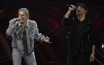 Italian singers Il Tre (L) and Fabrizio Moro perform on stage at the Ariston theatre during the 74th Sanremo Italian Song Festival in Sanremo, Italy, 09 February 2024. The music festival runs from 06 to 10 February 2024.   ANSA/RICCARDO ANTIMIANI