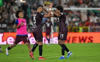 Torino's Saúl Coco and Torino's Adam Masina celebrates a victory at the end of match during the italian soccer Serie A match between Venezia Football Club vs Torino FC on august 30, 2024 at the Pier Luigi Penzo stadium in Venice, Italy. ANSA/Alessio Marini