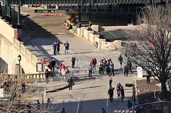 epa11153750 Police at the scene of shooting near Union Station following the NFL Super Bowl LVIII Victory Parade for the Kansas City Chiefs in downtown Kansas City, Missouri, USA, 14 February 2024. According to the Kansas City Missouri police department (KCPD) and KCPD Chief Stacey Graves, shots were fired west of Union Station at the conclusion of the Chiefs rally. Two suspects were detained. Multiple people were shot, with one of them confirmed as deceased.  EPA/DAVE KAUP