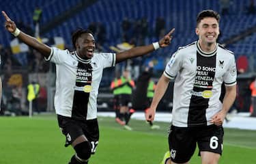 Udinese's Oier Zarraga (R) celebrates with his teammates after scoring the 1-2 goal during the Italian Serie A soccer match between SS Lazio and Udinese at the Olimpico stadium in Rome, Italy, 11 March 2024.  ANSA/ETTORE FERRARI

