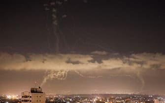 Streaks of smoke are seen as Israel's Iron Dome anti-missile system intercepts rockets launched from the Gaza Strip towards Israel, as seen from Gaza City. Witnesses and security sources said, hours after militants in the Palestinian enclave fired a rocket into Israel. The strikes, the second in 48 hours after a previous rocket strike, were concentrated on the centre of the blockaded coastal territory, they said. (Photo by Ahmed Zakot / SOPA Images/Sipa USA)