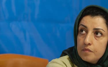 Iranian female human rights activist, Narges Mohammadi, looks on while attending a session in the former office of the Defenders of Human Rights Association in central Tehran, Iran on November 19, 2007. The group of 16 experts expressed grave concerns that Ms. Mohammadi appears to have contracted COVID-19 in Zanjan Prison. Ms. Mohammadi has been in detention since 2015 on charges that stem from her human rights work. She received a combined 16-year prison sentence in May 2016, of which she will need to serve 10 years under Iranian law, According to the office of the High Commissioners of the United Nations Human Rights. (Photo by Morteza Nikoubazl/NurPhoto via Getty Images)