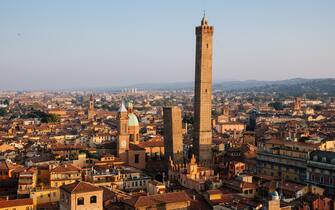 Bologna, panoramic view of the city and Garisenda and Asinelli Tower at sunset. Emilia Romagna, Italy