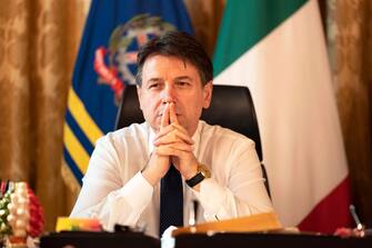 epa08966942 A handout photo made available by Chigi Palace Press Office shows Italian resigned Prime Minister Giuseppe Conte in his office at Chigi Palace, Rome, 26 January 2021. Conte's coalition government, which has been in power since September 2019, was plunged into turmoil by the withdrawal last week of former premier Matteo Renzi's Italia Viva party. Media reports suggest Conte will seek a new mandate to form a new government to run Italy as it battles the coronavirus pandemic, which has left more than 85,000 people dead in the country and crippled the economy.  EPA/FILIPPO ATTILI / CHIGI PALACE PRESS OFFICE / HANDOUT  HANDOUT EDITORIAL USE ONLY/NO SALES