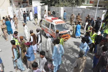 MASTUNG, PAKISTAN - SEPTEMBER 29: Injured citizens are brought to hospital after the attack at a procession to celebrate Eid Miladun Nabi, the birthday of Prophet Muhammad, near a mosque in Mastung district of southwestern province of Balochistan, Pakistan on September 29, 2023. At least 52 people, including a police officer, were killed in the first attack. Those injured in the blast were taken to nearby hospitals, with many in critical condition. (Photo by Mazhar Chandio/Anadolu Agency via Getty Images)
