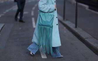 PARIS, FRANCE - SEPTEMBER 30: Tanja Comba seen wearing a blue bottega veneta coat and a matching bag by bottega veneta and a white prada top, outside Giambattista Valli during Paris Fashion Week on September 30, 2022 in Paris, France. (Photo by Jeremy Moeller/Getty Images)