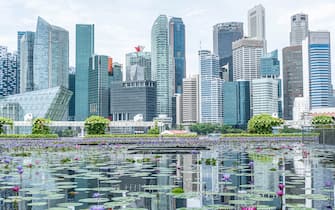 The buildings area is Raffles Place, Central Area of Singapore.