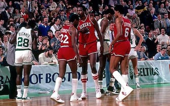 BOSTON - 1983:  Andrew Toney #22, Moses Malone #2 and Julius Erving #6 of the Philadelphia 76ers huddle on the court during a game played in 1983 at the Boston Garden in Boston, Massachusetts.  NOTE TO USER: User expressly acknowledges that, by downloading and or using this photograph, User is consenting to the terms and conditions of the Getty Images License agreement. Mandatory Copyright Notice: Copyright 1983 NBAE (Photo by Dick Raphael/NBAE via Getty Images)