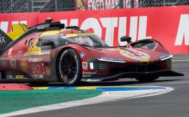 Italian driver Antonio Fuoco steers the Ferrari 499P during Le Mans 24-hours endurance race in Le Mans, western France, on June 16, 2024. (Photo by GUILLAUME SOUVANT / AFP) (Photo by GUILLAUME SOUVANT/AFP via Getty Images)