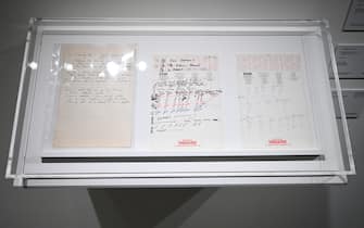 Lyric and music sheets ‘We Are the Champions’ written by Freddie Mercury on display, including clothes and jewelry worn by Mercury during Queen concerts, handwritten lyrics, personal items and art, to go up for auction in London this coming  September. (Photo by Anthony Behar/Sipa USA)
