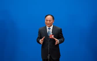 BEIJING, CHINA - MARCH 04: Li Shufu, founder and chairman of domestic automaker Zhejiang Geely Holding Group and a member of the 14th National Committee of the Chinese People's Political Consultative Conference (CPPCC), is interviewed ahead of the opening meeting of the first session of the 14th CPPCC National Committee at the Great Hall of the People on March 4, 2023 in Beijing, China. (Photo by VCG/VCG via Getty Images)