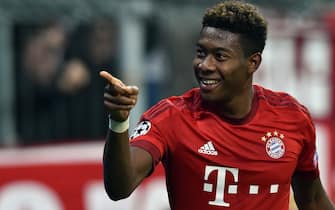epa05011356 Munich's David Alaba celebrates after scoring the 3-0 goal during the UEFA Champions League group F soccer match between Bayern Munich and FC Arsenal at Allianz Arena in Munich, Germany, 04 November 2015.  EPA/PETER KNEFFEL
