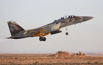 epa10717789 Israeli Air Force F15 fighter aircraft takes off during an air show at the graduation ceremony of new combat fighter pilots of the Israeli Air Forces at the Hatzerim Air Force base, outside Beersheva, in southern Israel, 29 June 2023.  EPA/ABIR SULTAN