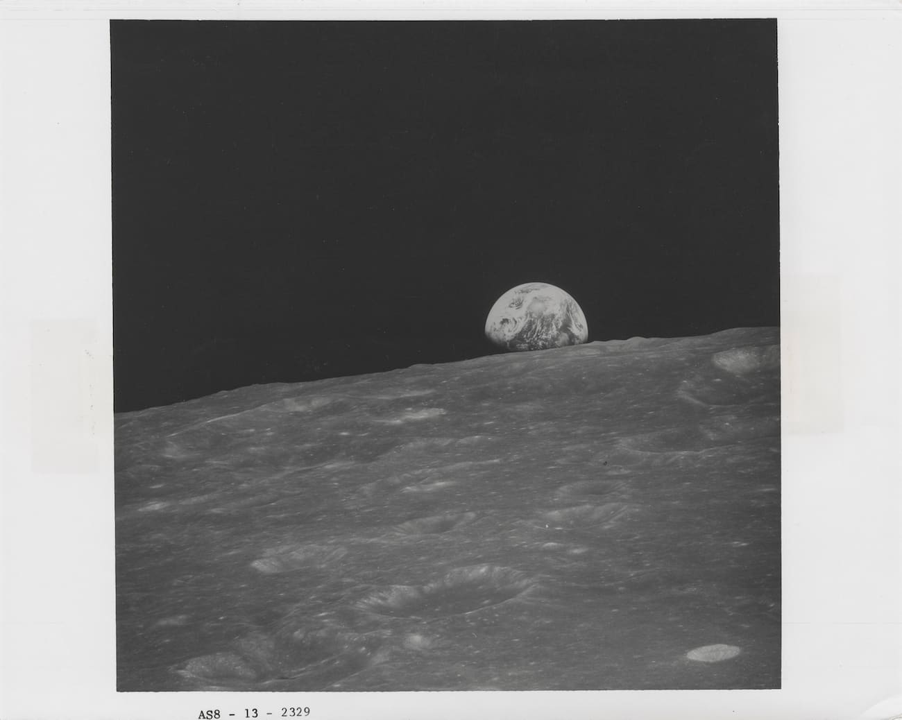 The first-ever photograph of Earthrise captured by William Anders during Apollo 8 (Estimate €12,000 - €18,000)