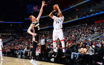 ATLANTA, GA - JANUARY 20: Norman Powell #24 of the Toronto Raptors shoots the ball against the Atlanta Hawks on January 20, 2020 at State Farm Arena in Atlanta, Georgia.  NOTE TO USER: User expressly acknowledges and agrees that, by downloading and/or using this Photograph, user is consenting to the terms and conditions of the Getty Images License Agreement. Mandatory Copyright Notice: Copyright 2020 NBAE (Photo by Scott Cunningham/NBAE via Getty Images)