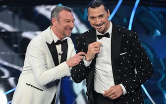 Sanremo Festival host and artistic director Amadeus (L) with Swedish former football player Zlatan Ibrahimovic (R) on stage at the Ariston theatre during the 74rd Sanremo Italian Song Festival, Sanremo, Italy, 06 February 2024. The music festival will run from 06 to 10 February 2024.  ANSA/ETTORE FERRARI