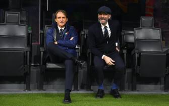 MILAN, ITALY - OCTOBER 06: Head coach of Italy Roberto Mancini and Gianluca Vialli look on before the UEFA Nations League 2021 Semi-final match between Italy and Spain at Giuseppe Meazza Stadium on October 06, 2021 in Milan, Italy. (Photo by Claudio Villa/Getty Images)
