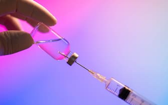 Syringe and Coronavirus vaccine