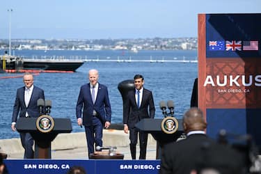 SAN DIEGO, CA - MARCH 13: U.S. President Joe Biden (C), Prime Minister Rishi Sunak of the United Kingdom (R) and Prime Minister Anthony Albanese of Australia (L) arrive for the Australia Ã¢ United Kingdom Ã¢ United States (AUKUS) Partnership meeting at Naval Base Point Loma in San Diego, California, United States on March, 13, 2023. (Photo by Tayfun Coskun/Anadolu Agency via Getty Images)