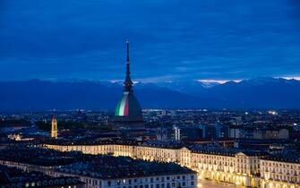 April 14, 2020, Turin, Piedmont/Turin, Italy: A view shows  the Mole Antonelliana Turin  with the colors of the Italian national flag to express solidarity and cohesion during COVID-19 emergencyon April 14, 2020 in Italy, during the c ountry's lockdown aimed at curbing the spread of the COVID-19 infection, caused by the novel coronavirus. (Credit Image: © Alberto Gandolfo/Pacific Press via ZUMA Wire)