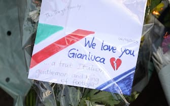 LONDON, ENGLAND - JANUARY 06: Messages on floral tributes are shown as tributes are made to the former Chelsea striker and manager Gianluca Vialli following his death at the age 58, at Stamford Bridge on January 06, 2023 in London, England. Former Italy, Juventus and Chelsea footballer Gianluca Vialli died today, aged 58, from pancreatic cancer. Vialli made 59 appearances for Italy, scoring 16 goals. He joined Chelsea as a striker in 1996 and later assumed the role of their player-manager winning the Cup Winners' Cup in 1998, and the League Cup. He is survived by his wife and two daughters. (Photo by Leon Neal/Getty Images)