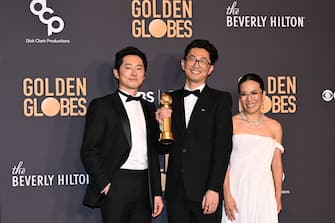 (From L) US actor Steven Yeun, South Korean writer Lee Sung Jin and US actress Ali Wong, winners of the Best Performances in a Limited Series, Anthology Series, or Motion Picture Made for Television and Limited Series, Anthology Series, or Motion Picture Made for Television award for "Beef" pose in the press room during the 81st annual Golden Globe Awards at The Beverly Hilton hotel in Beverly Hills, California, on January 7, 2024. (Photo by Robyn BECK / AFP) (Photo by ROBYN BECK/AFP via Getty Images)