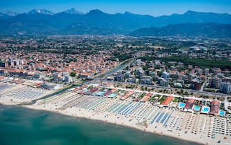 VIAREGGIO, ITALY - JUNE 27: Aerial view, from helicopter, the beaches of Versilia in Tuscany on June 27, 2019 in Viareggio, Italy. Italy's nearly 8000 km (5,000 miles) coastlines and islands stretch across the Mediterranean Sea and attract large numbers of both local and foreign tourists during the summer season. (Photo by Fabrizio Villa/Getty Images)