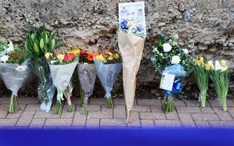 Flowers and tributes by pictures of Gianluca Vialli on the Chelsea's Wall of Fame at the club's Stamford Bridge ground, London, following the announcement of the death of the former Italy, Juventus and Chelsea striker who has died aged 58 following a lengthy battle with pancreatic cancer. Picture date: Friday January 6, 2023. (Photo by Kirsty O'Connor/PA Images via Getty Images)