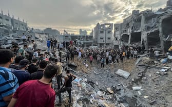 31 October 2023, Palestinian Territories, Jabalia: A screen grab from a video shows Palestinians searching for survivors following an Israeli airstrike in the Jabalia refugee camp north of Gaza City. (Best Quality Available) Photo: Fadi Wael Alwhidi/dpa (Photo by Fadi Wael Alwhidi/picture alliance via Getty Images)