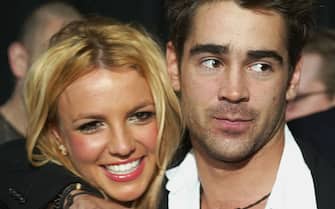 HOLLYWOOD - JANUARY 28:  Singer Britney Spears and actor Colin Farrell arrive at the premiere of 'The Recruit' at the Cinerama Dome on January 28, 2003 in Hollywood, California. (Photo by Kevin Winter/Getty Images)