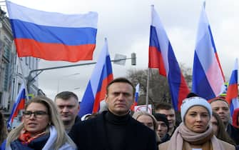 Russian opposition leader Alexei Navalny, his wife Yulia, opposition politician Lyubov Sobol and other demonstrators take part in a march in memory of murdered Kremlin critic Boris Nemtsov in downtown Moscow on February 29, 2020. (Photo by Kirill KUDRYAVTSEV / AFP) (Photo by KIRILL KUDRYAVTSEV/AFP via Getty Images)